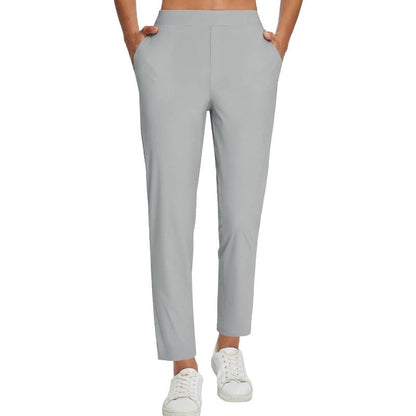 Pantalon élastique à taille haute avec poches zippées pour femmes