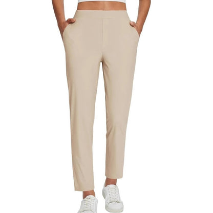 Pantalon élastique à taille haute avec poches zippées pour femmes